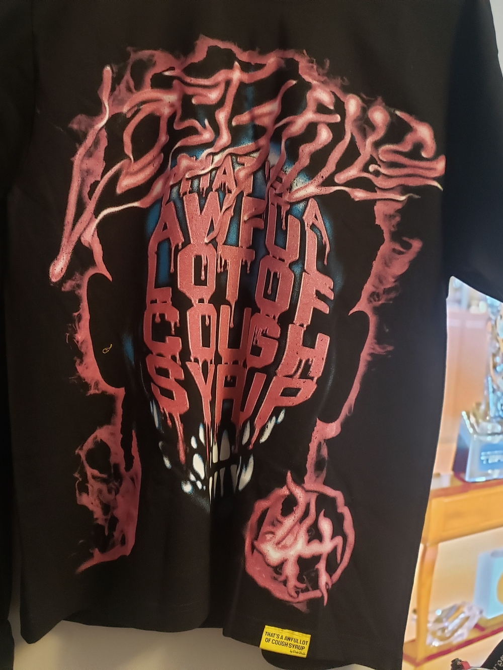 Graphic Black Tee with Pink and Blue Horror Skull Design